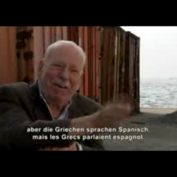 Μωυσής Μπουρλάς: Εδώ σε ηλικία 87 ετών, εξηγεί σε ένα ντοκιμαντέρ για τη Θεσσαλονίκη, ότι προπολεμικά η κοινή γλώσσα Εβραίων και Χριστιανών λιμενεργατών ήταν τα ισπανοεβραϊκά.