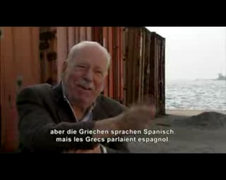 Εδώ σε ηλικία 87 ετών, εξηγεί σε ένα ντοκιμαντέρ για τη Θεσσαλονίκη, στο εξαιρετικό φιλμ του Paolo Poloni 'Salonica', ότι προπολεμικά η κοινή γλώσσα Εβραίων και Χριστιανών λιμενεργατών ήταν τα ισπανοεβραϊκά.
